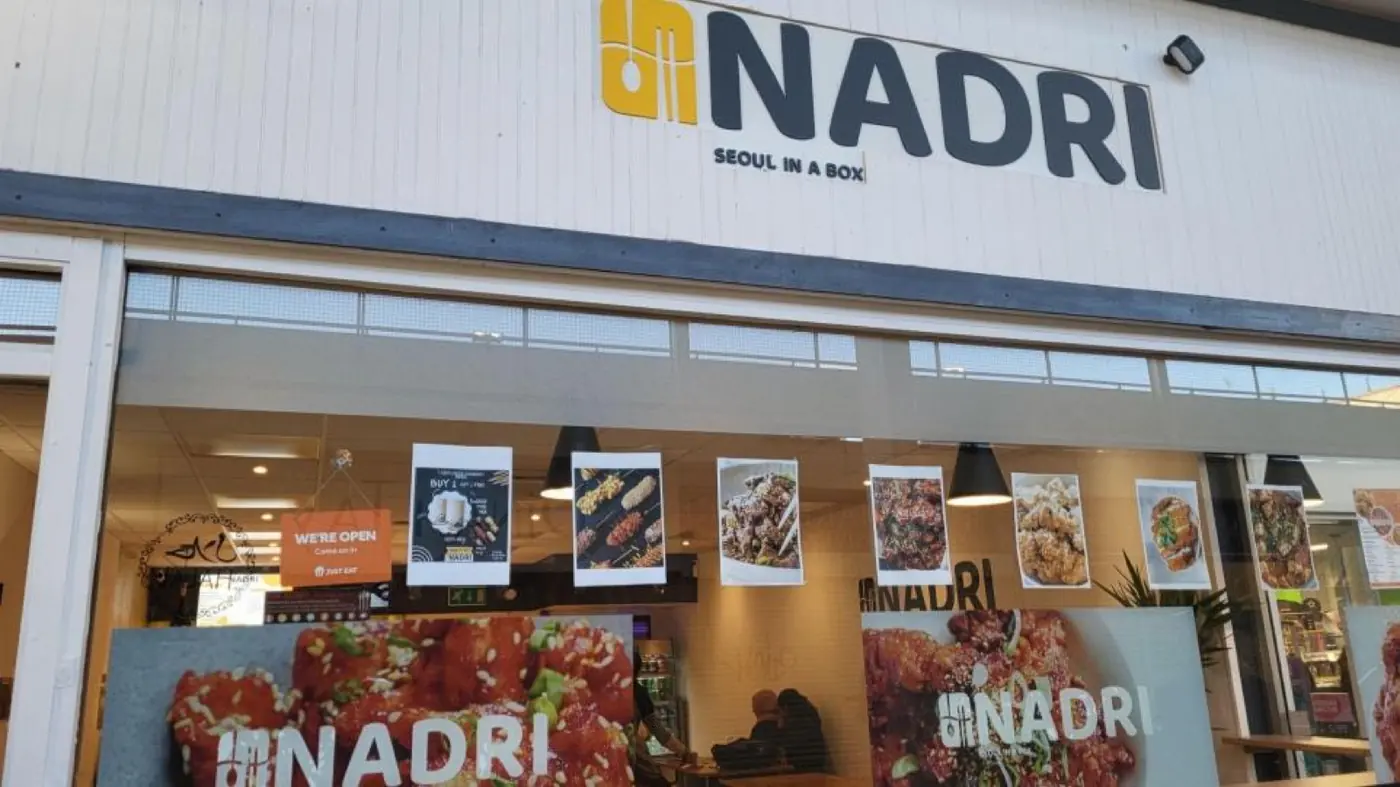 The Nadri shopfront on Wallington Square, counter and window visible through the glass